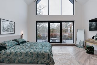 Woodlands glass home